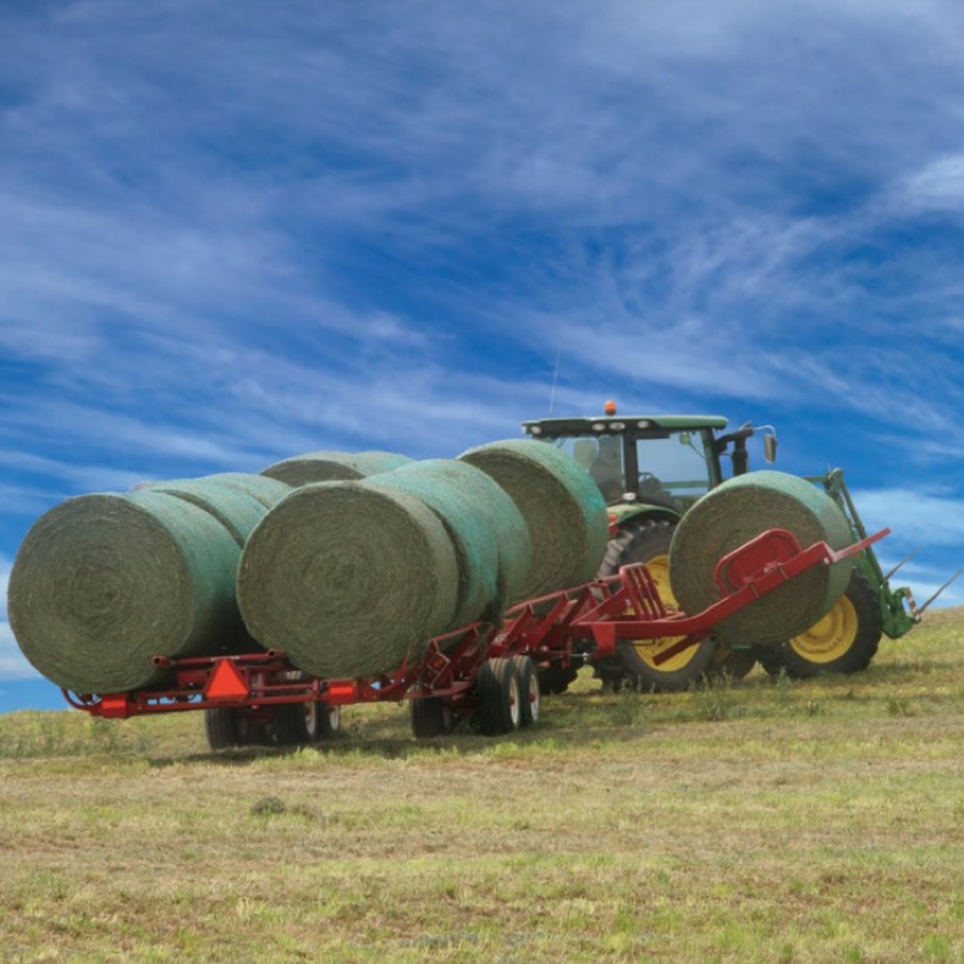 Move bales from field to storage without leaving the tractor seat. 

Pick bales from any direction with the versatile picker arm. When unloading the Morris Hay Hiker tilts the frame bed to the ground and the push bar pushes the bales off the bed as the tractor moves forward.