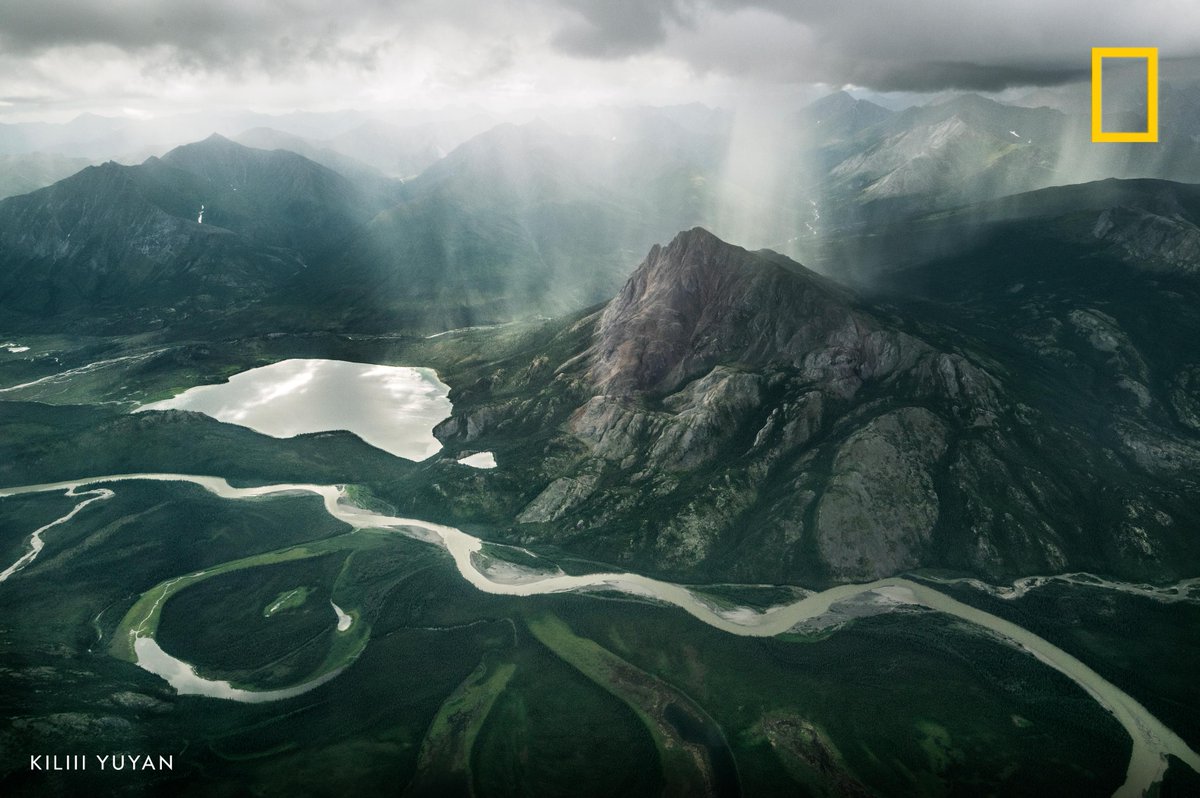 NatGeo's tweet photo. Takahula Lake lies near the winding Alatna River, Arctic National Park, Alaska, USA https://t.co/BDxchn8QRg