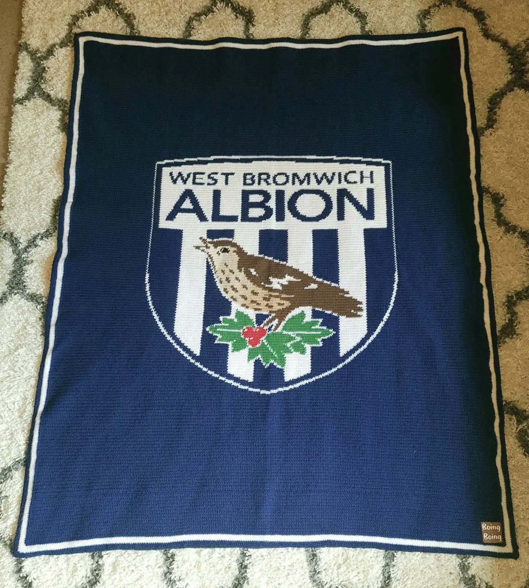 madelin_kelly's tweet photo. May have taken 8 months on and off but the @WBA blanket is complete and gifted. Over 100,000 stitches, handsewn fleece backing and a home-made tag to finish = one happy boyfriend #crochetblanket #singlecrochet #graphgan #wba #handmade https://t.co/ZatmCC1chd