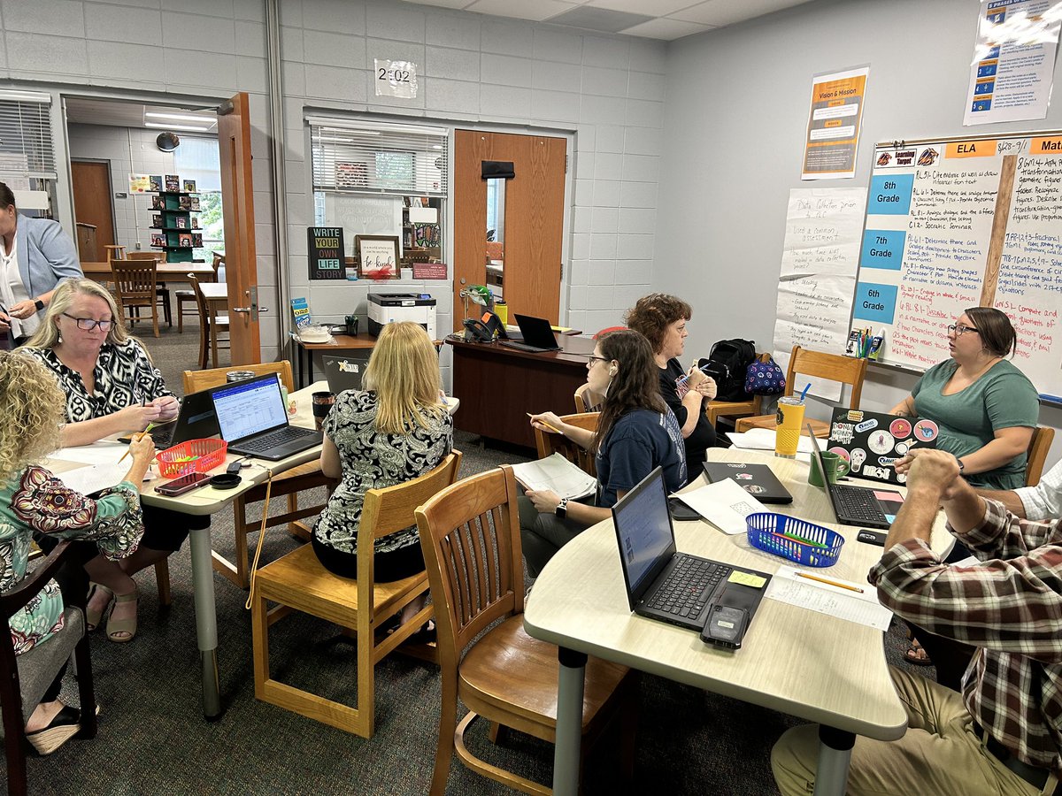 Teachers are participating in a Give One Get one strategy to share ideas about how activities in their lesson plans address both the standards and level of rigor. They are also analyzing data and DOK levels from their PLC common assessment. #lakeviewmiddle #lionpride #workfamily