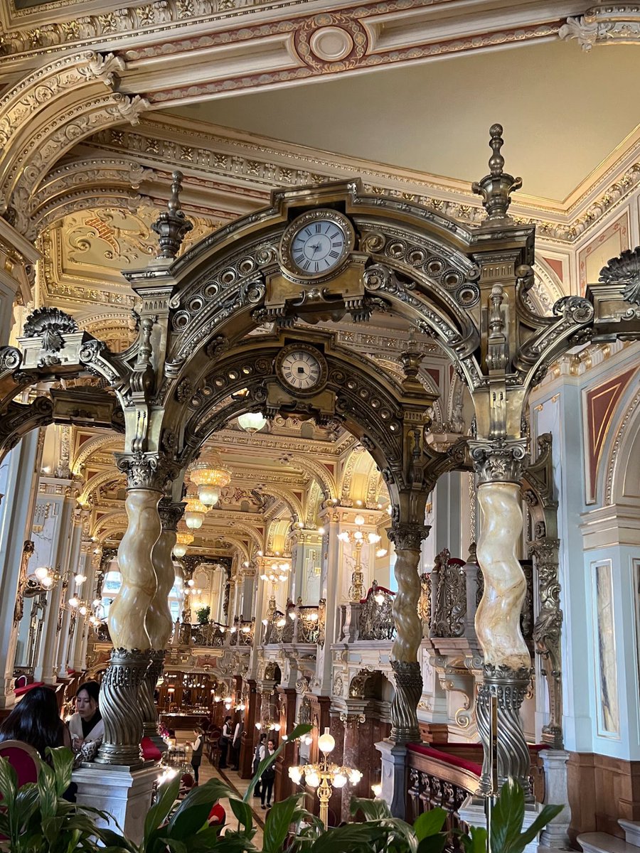 Consider if this is the most beautiful cafe in the world?  

It gets my vote. New York Cafe, Budapest Hungary.