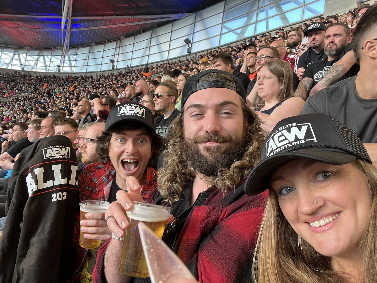 Welsh_Bailey's tweet photo. When your big little brother and husband-to-be drag
You to #AEW #AEWAllIn #AEWWembley  you embrace it, get drunk, and buy merch 😂 #JungleWanker  #AllIn #welshGirlInLondon @ValKilmer4Life https://t.co/iMYE0citj4