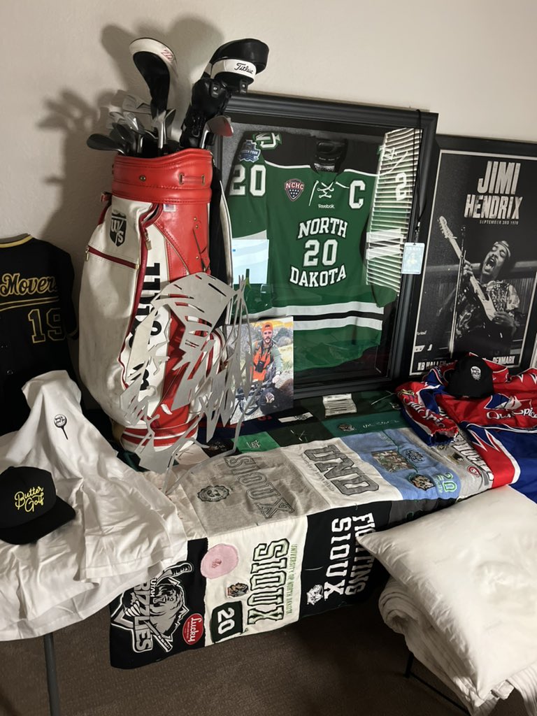 Gausmus47's tweet photo. Rodney Dangerfield bag (caddyshack), Sioux Jersey, @MinneMovers Jersey, Jimi Hendrix, Butter Golf, Cal Naughton Jr. Uniform, Grammas UND quilt. Are we back or are we back? #GoodU https://t.co/Me91nBiUEo