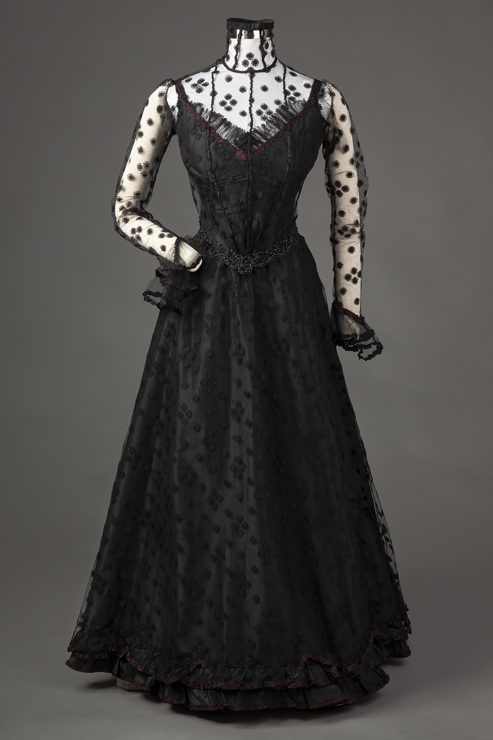Evening dress 1898–1900 House of Worth French By the 1890s, Worth was using  large-sized ornament and was increasing simplifying his silhouette. He  created this dress by separating zones of monumental schematic roses