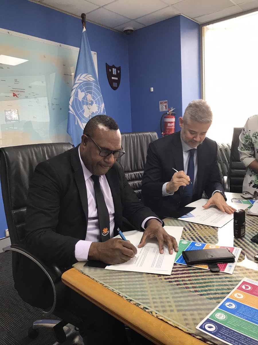 DMcLachlanK's tweet photo. With the stroke of a pen, #UN #ResidentCoordinator & Planning Secretary sign the new #PNG #UNSDCF Cooperation Framework 2024-28 outlining key pathways for #UNCT development programming & #SDG achievement: climate, service delivery, governance, human dignity & gender equality. https://t.co/HLH1rQTvnz