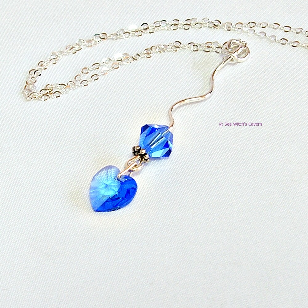 Sapphire birthstone necklace handmade with Swarovski crystal hearts and sterling silver #CrystalJewellery etsy.me/2bdUwwc
#onlinecraft