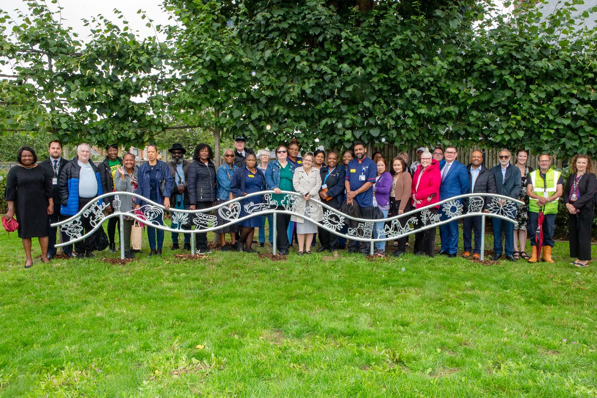 EnfieldCouncil's tweet photo. A new memorial garden to remember Enfield residents who lost their lives or were affected during the COVID-19 pandemic was unveiled in #Edmonton Green. The opening recognised the tireless work of staff in #NHS, council and voluntary sectors: https://t.co/CWe1jJOTs3 #SaferEnfield https://t.co/2av9nPacki