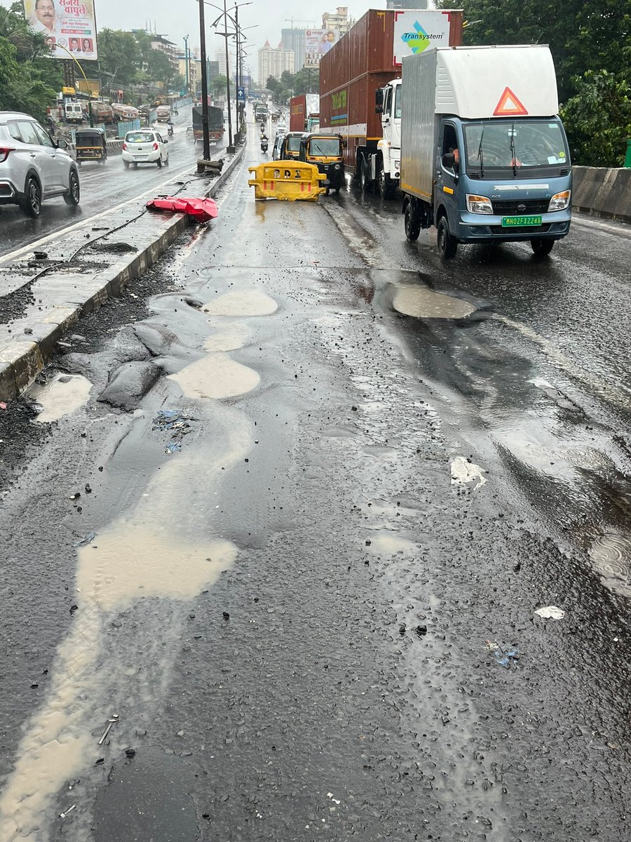 QueenofThane's tweet photo. The image of injured rider is a brother of a Twitter user who has sent me these images. Dear @TMCaTweetAway its been days after the accident yet you failed the Patlipada Flyover properly. Will you do your work only if someone dies ?  #thane #mumbai https://t.co/DuShlR3CSS