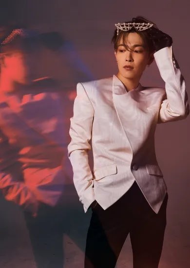 PopBase's tweet photo. ATEEZ's Hongjoong stuns for WWD. https://t.co/qFOMTvPCnN