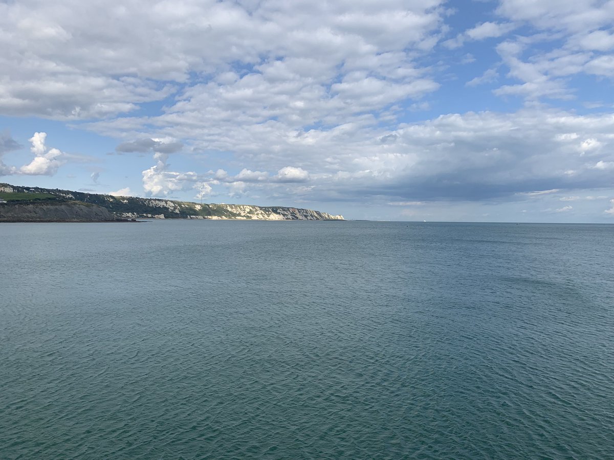 SandwichJunior's tweet photo. Mr Dyson reading somewhere low: under the harbour arm in Folkestone with Anthony Gormeley’s ‘Another Time XVIII’ #SJSSummerReadingChallenge https://t.co/i9VHH7ICsj