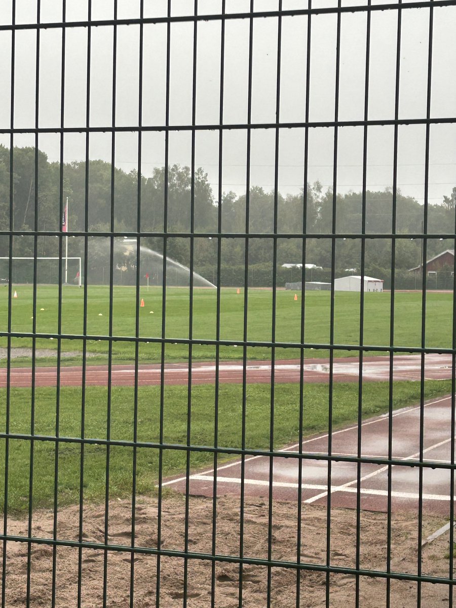 Floodings yesterday and full day of rain and now watering the pitch. #espoo