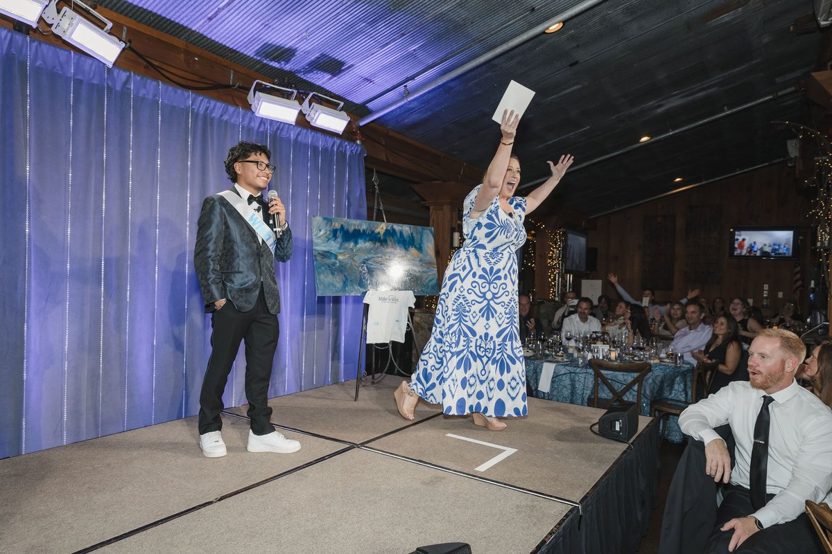 MakeAWishEastNC's tweet photo. #WishWednesday Elvis joined us at Wish Ball to share his story battling cancer along with what he hoped to accomplish with his wish to have a gaming room makeover. Here's the moment he found out his wish was coming true thanks to #NPC23 @jtmusicteam and Rockit Gaming! (1/2) https://t.co/hvnw8yDKOM