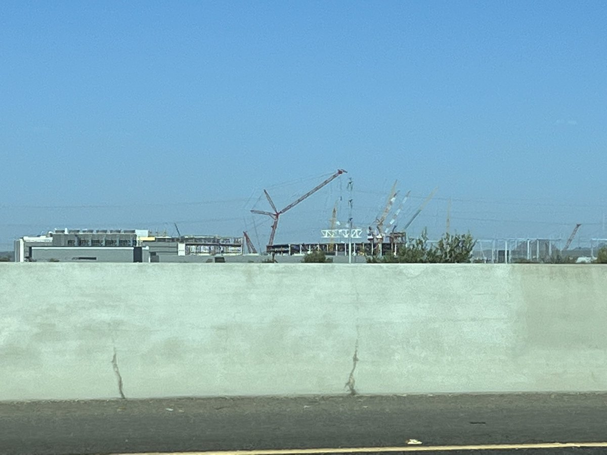 StephenJCrowley's tweet photo. @SluggoDoug listening to 1st Wave..passing ground zero for T2 Skynet!! (Huge chip factory going up) https://t.co/zTdv8l6LM0