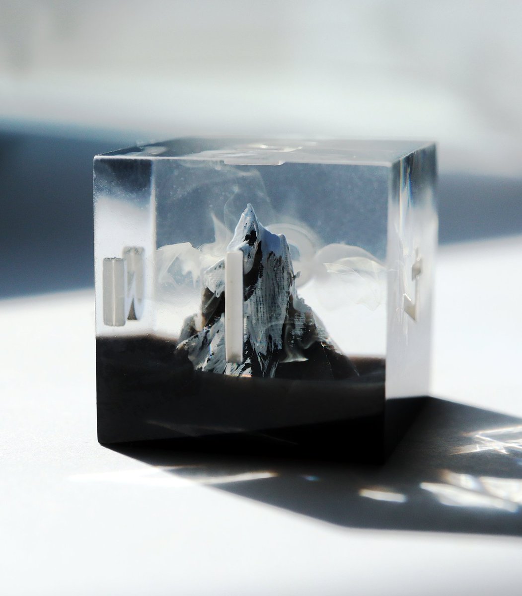 EVERYTHINGDICE's tweet image. Wyvern Spires 🗻☁️ the final new design dropping this Friday, Sept 1st! Featuring handpainted snowcap mountains and wisps of dancing clouds. #dnd #dice