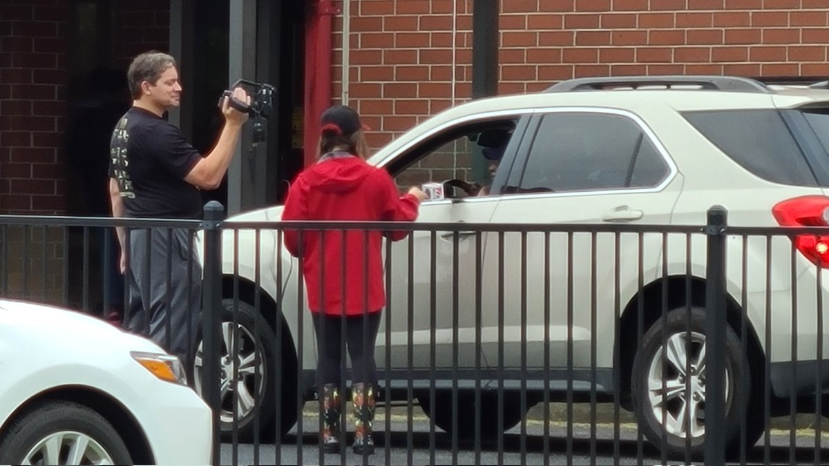 RedB3ARD's tweet photo. So nice of @WLTX to assign a reporter to hold up the car rider line at Saint Matthews K-8 as parents are trying to get their kids home and out of the storm. https://t.co/z11dOmvo9Z