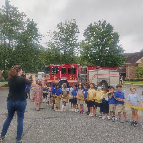 Our kindergartener got to meet the local <a href="/CityofRoswellGA/">Roswell, Georgia</a> #firefighters today! Best part? Holding the fire hose AND hearing the siren! #principalsinaction #fast2thefuture