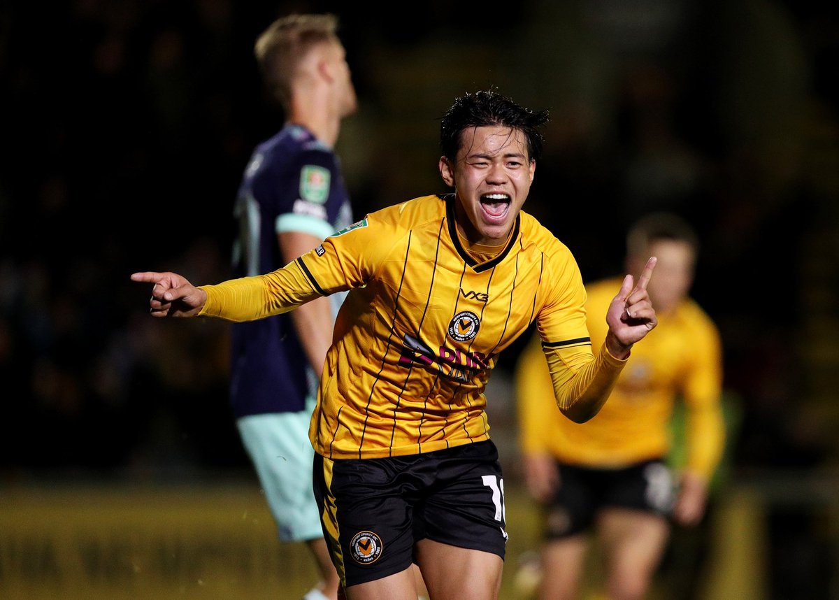 NewportCounty's tweet photo. A moment to 𝙧𝙚𝙢𝙚𝙢𝙗𝙚𝙧… ✨

#NCAFC🧡🖤 https://t.co/ivqpF7yrFe