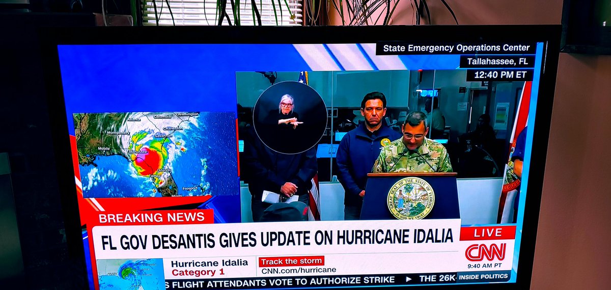 dokovrok's tweet photo. A glum looking DeSantis heading up the Idalia response in FL.  I haven't seen him throw rolls of paper towels yet, so he needs to get that going. https://t.co/dzUyuGqtuq