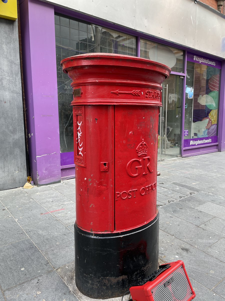 The last of my Liverpool lovelies for this #PostboxSaturday, a George with stamps in the side. (And added urban challenge of taking photo around the busker!)