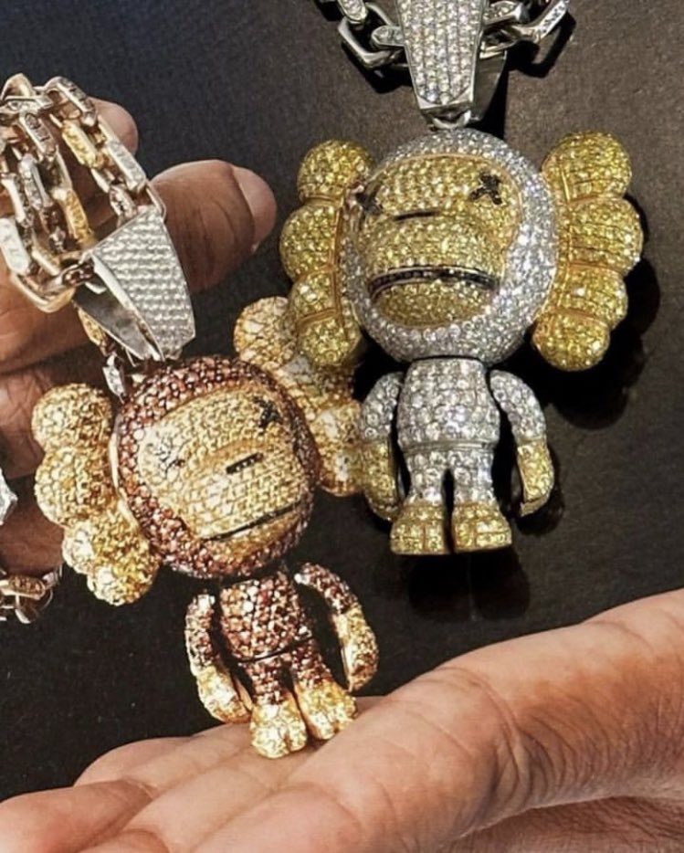 Shtreetwear's tweet photo. Pharrell &amp; NIGO’s BAPE x KAWS Pendants by Jacob &amp; Co https://t.co/OmknJFnJoj