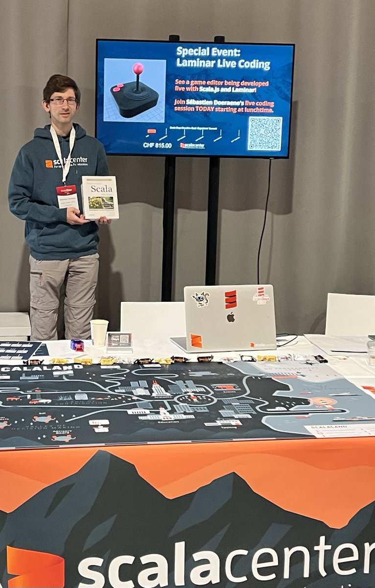 Stop by the Scala Center's booth at #ScalaDays lunchtime today at 1:15pm for announcement of the Puzzler book giveaway (signed by <a href="/odersky/">Martin Odersky</a> at 1:30pm), and <a href="/sjrdoeraene/">Sébastien Doeraene</a> will begin live coding a game with Scala.js and Laminar! <a href="/scaladays/">Scala Days</a>