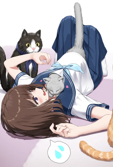 猫にかこまれる女の子 
