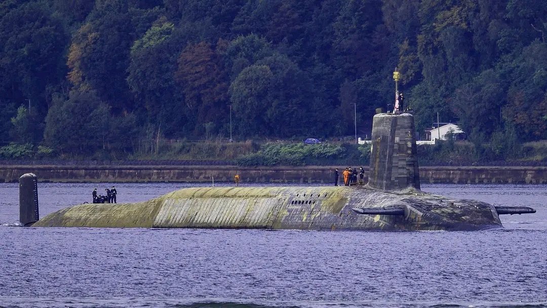 HMS Vanguard caked in algae