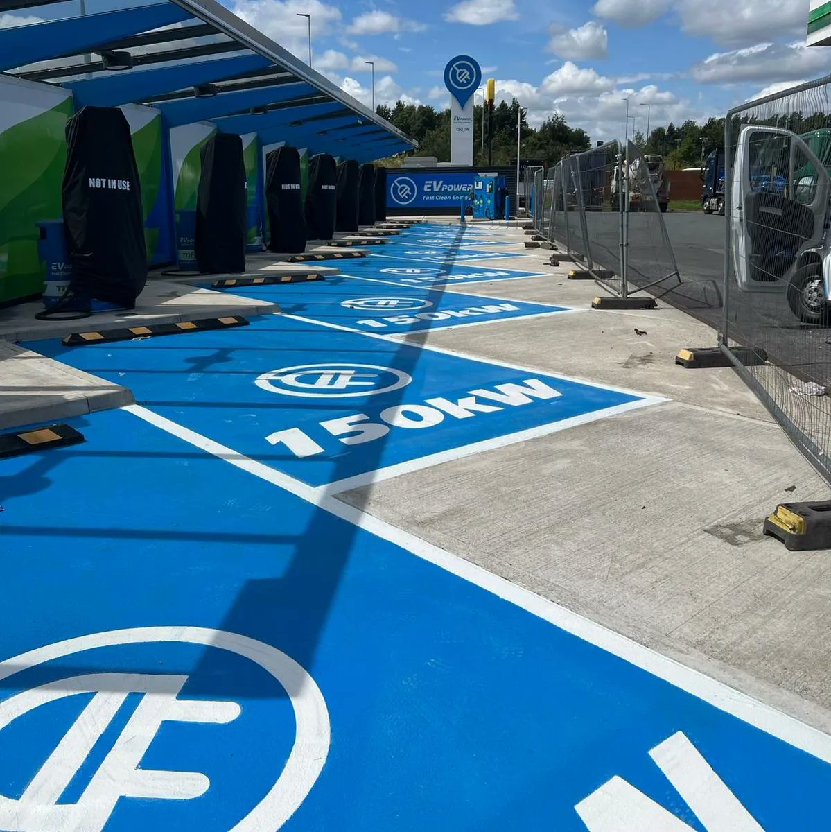 _TMSLtd's tweet photo. Nice job up in North East on behalf of Motor Fuel Group, marking out a new EV charging bay. Thermoplastic blue base blocked out and then logos and lines in white superimposed on top. Looks fantastic! 

Check out our nationwide #evbaymarking https://t.co/VwW8nJNzEo. 0161 976 2382. https://t.co/qGh5jI5Qn2