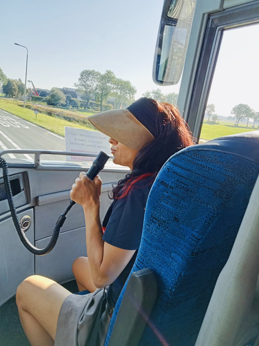 Tour guide Eva on the bus during Tour Company's tour to Volendam, Edam and Windmill Village Zaanse Schans!