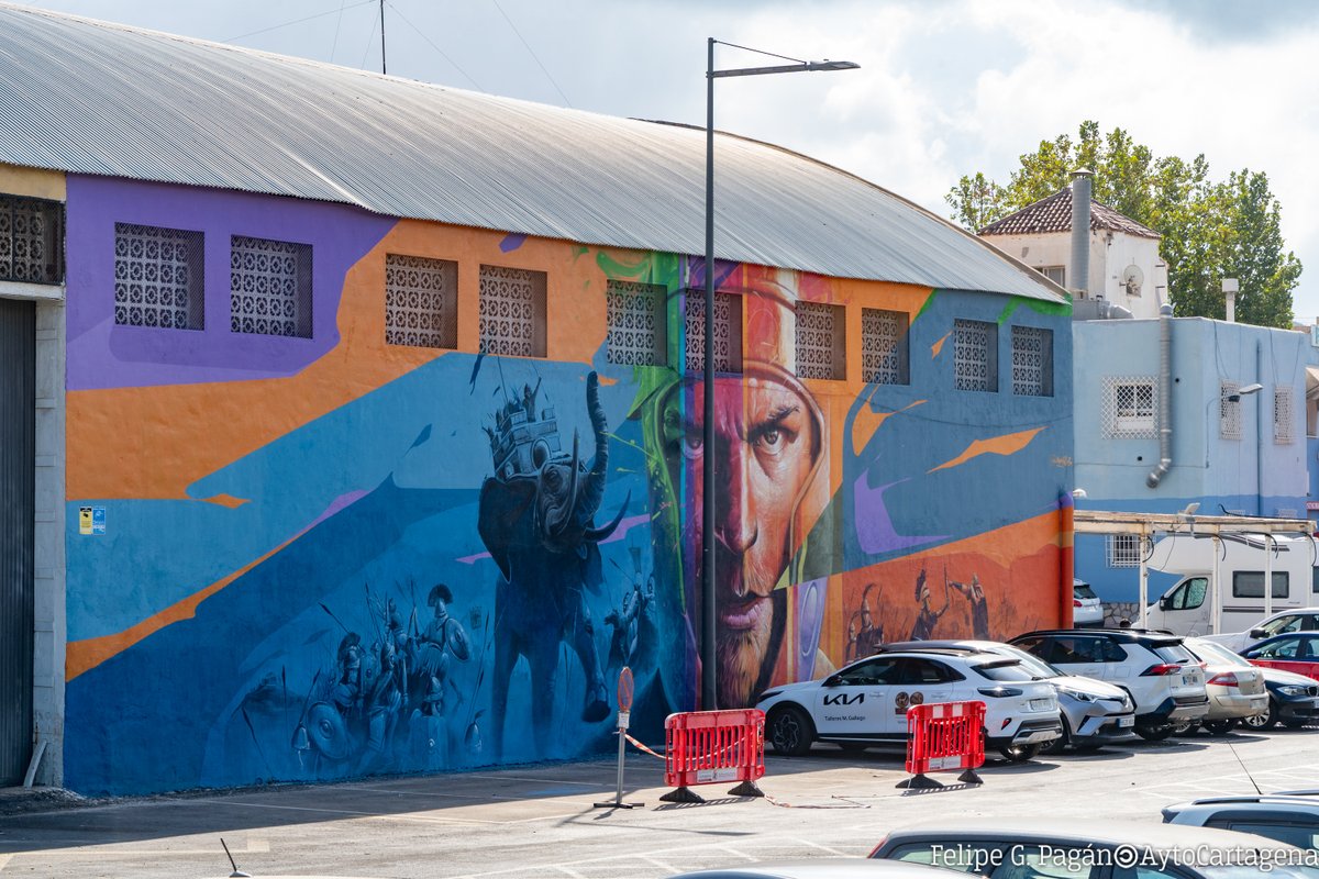 AytoCartagenaES's tweet photo. 📌Un mural de pintura de #Goyo203 representa la batalla de @CyR_Cartagena frente a la Cuesta del Batel de #Cartagena.

⚔️El artista representa la batalla de Aníbal y la parte romana en el mural, resaltando la importancia de esta épica confrontación.

ℹ️ https://t.co/7RnNtt4Q48 https://t.co/q7fZWL4fXe