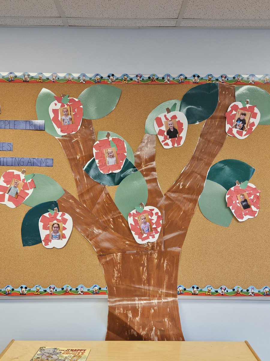 Way up high in an apple tree, 8 Littles apples smiled down at me!