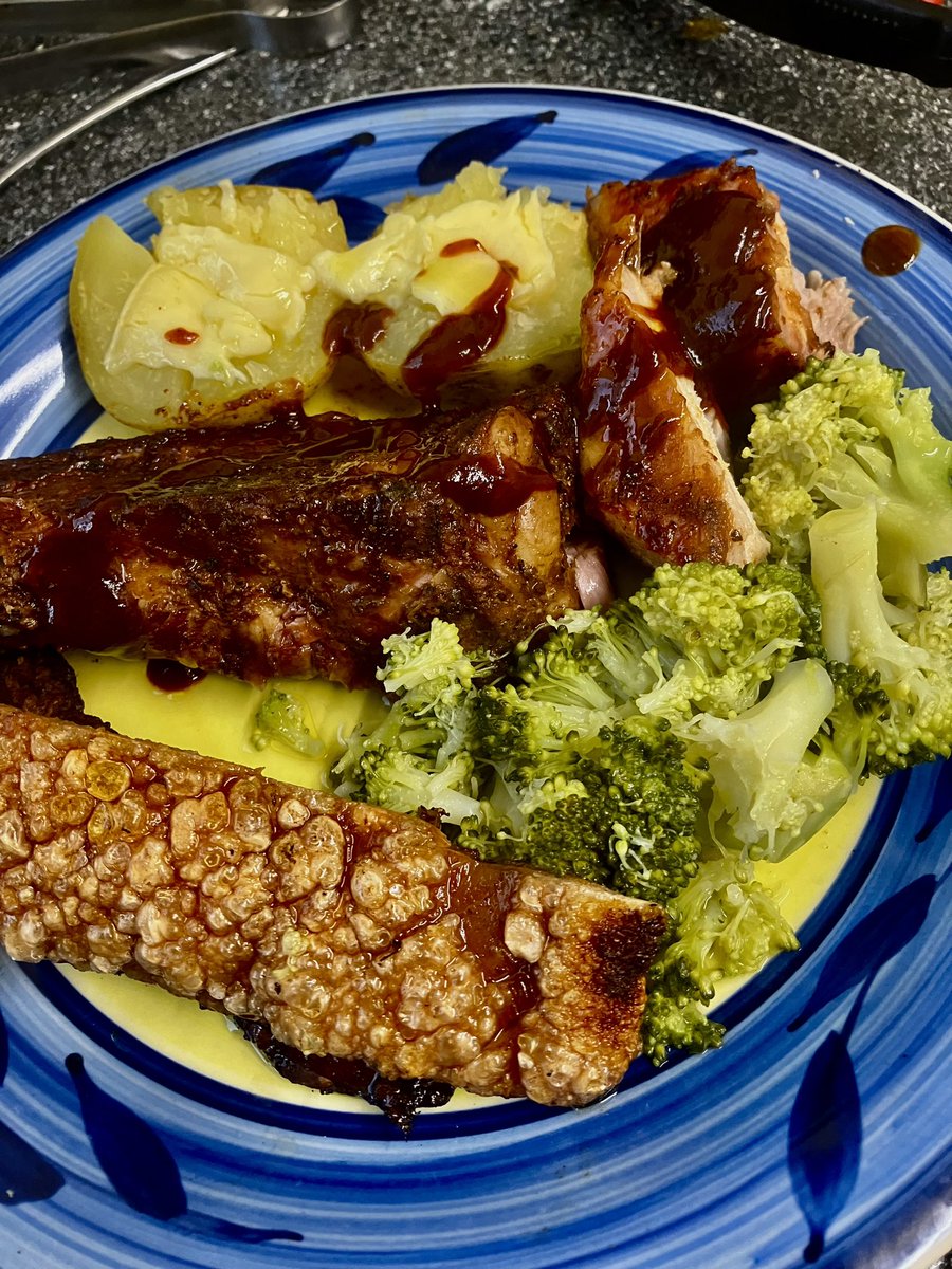 Finally got a crispy crackling after many tries.Bone in pork belly cooked to perfection on the WeberMT. Took 7 hours but worth the wait.served with Jacket spud and broccoli.Homemade bbq sauce.Melt in the mouth #BBQ #weberkettle