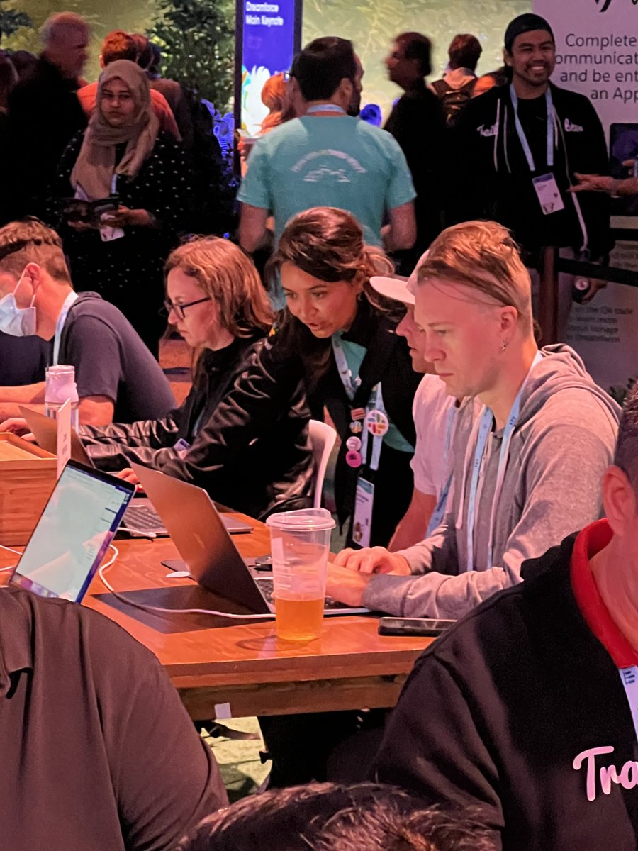 SlackAPI's tweet photo. Spotted 👀 Slack Developer Advocates @dacoffeebreak and @s_illiv working their magic to help developers build automated workflows at Camp Mini Hacks in the Trailblazer Forest 🪄🌲 

Mini Hacks will be going on all day, stop by for some one-on-one help! #DF23 https://t.co/o0tXJciOup