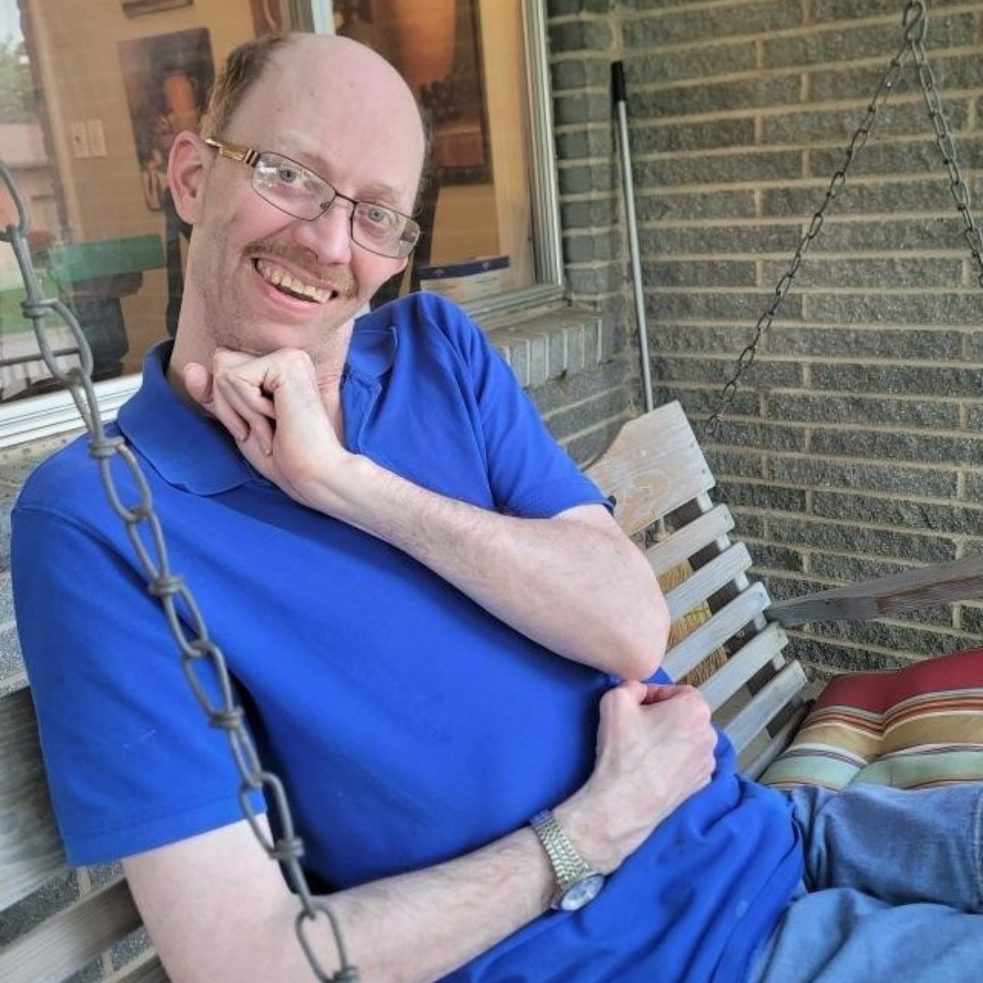 VOAOK's tweet photo. Meet Scotty, a client supported by Direct Support Professional Dwight! Scotty and Dwight have been enjoying fun activities this summer. From picnics in the park to relaxing porch swings while birdwatching, this pair knows how to have fun wherever they go. #DSPRW2023 https://t.co/Fd8lrLfbQV
