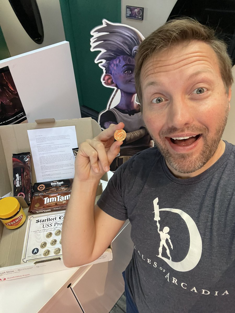 GoodAaron's tweet photo. A tremendous thank you from the #StarTrekProdigy team to @Serin019 and the STSP Facebook group for this incredible care package from Australia.

The medallions are out of this Quadrant  — as are the Tim Tams. We can’t wait to dive into a bowl of vegemite! https://t.co/nxO1Bx5PLj