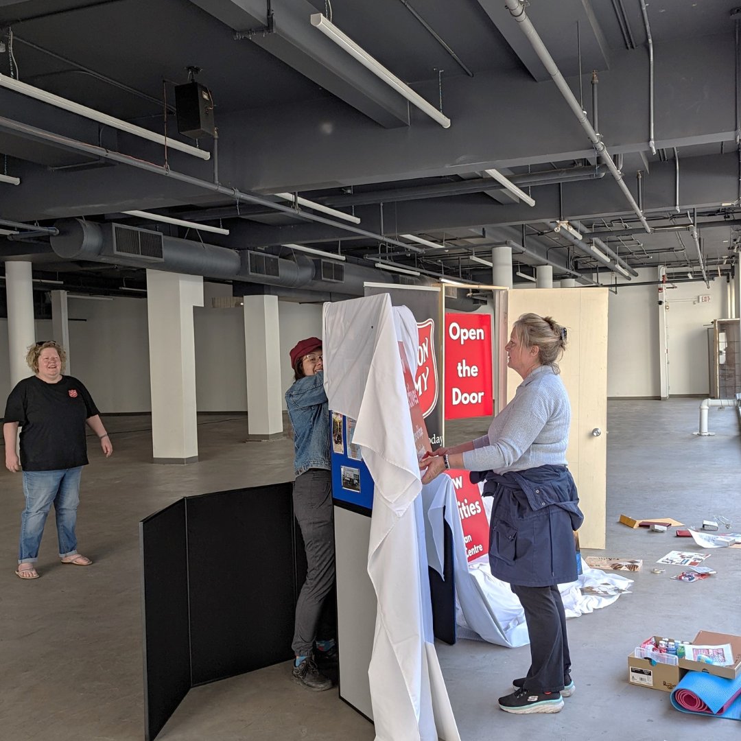 TSACSC's tweet photo. We are very excited to be participating in @lobbyfest this week. Thank you to our volunteers for helping set up our Open a Door window display at 808-1 St SW (and a thank you to Allied Properties for sharing your space!) https://t.co/LJkm8GooUT