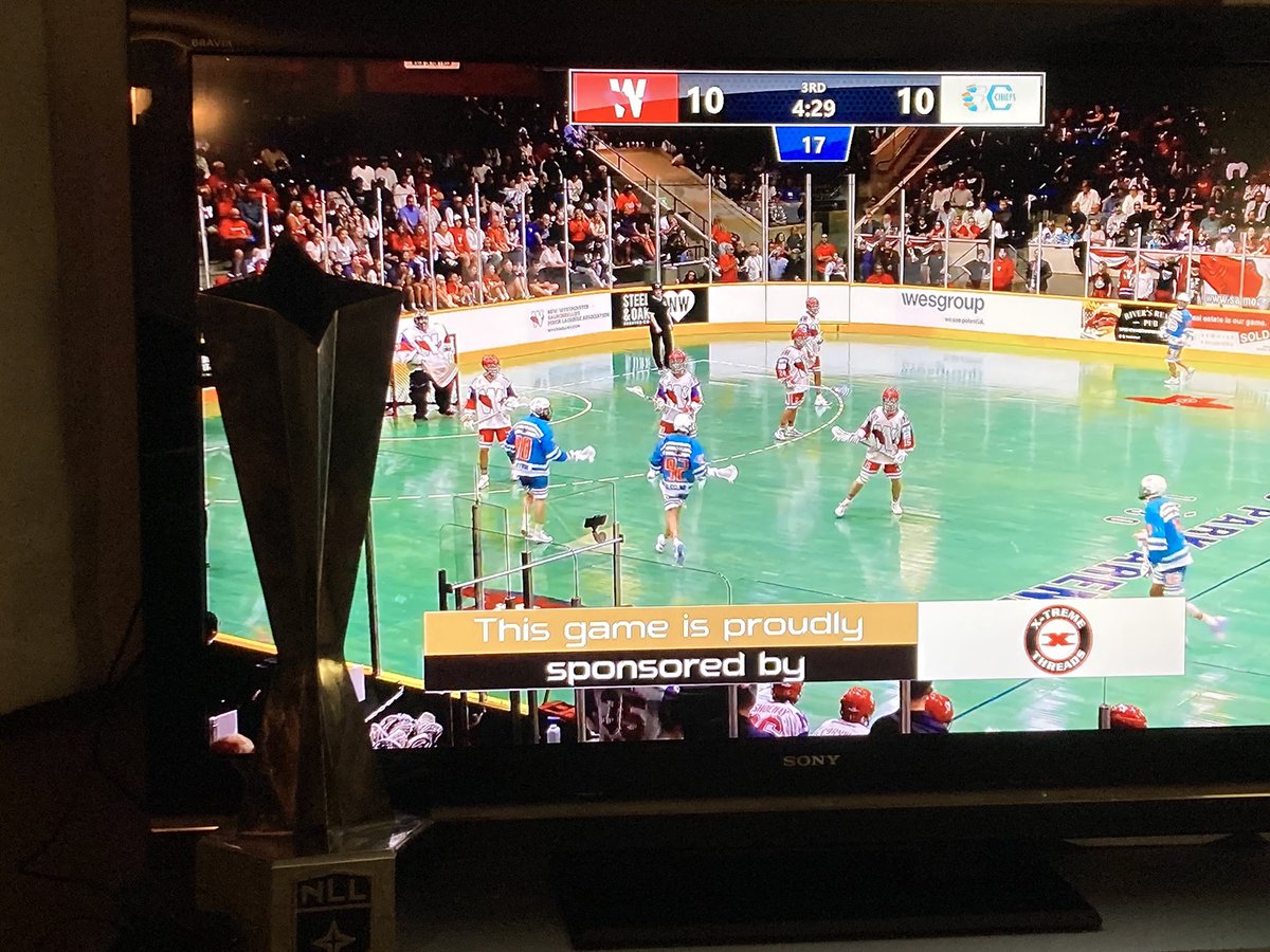 Watching <a href="/MannCup/">Mann Cup</a> Game #4 from Victoria <a href="/SN_Chiefs/">Six Nations Chiefs</a> <a href="/Salmonbellies/">NW Salmonbellies</a>  <a href="/PxP4Sports/">Jake Elliott</a> <a href="/FeraTino/">Tino Fera</a> with the <a href="/NLL/">NLL</a> Champions Cup in the house. <a href="/NLLBandits/">Buffalo Bandits</a> <a href="/bradmcculley/">Brad McCulley</a>