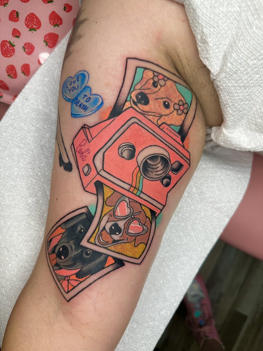 isabelh_tattoos's tweet image. my client asked me to draw her a barbie polaroid with photos of her dogs in the barbie art style coming out of it! i had so much fun with this 🩷✨