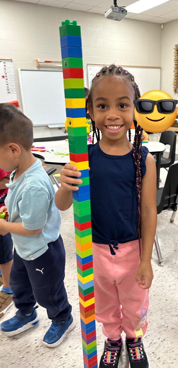 mrs_beadle's tweet photo. We love when building a tower quickly changes to building a tower bigger then herself to bigger then peers to bigger than classroom educators @SACTVDSB! We even invited @bperks21 and a very tall grade 8 to see who was taller! The tower just made it! @LisaPaiva6 @TVDSBKinder https://t.co/PJzyDE7ARh