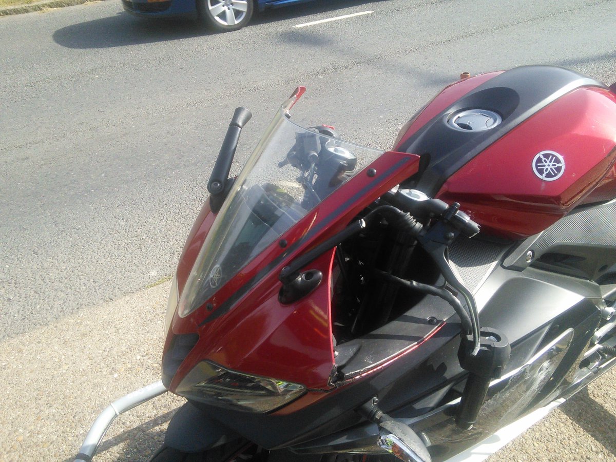 Trailer1one's tweet photo. Yamaha 125 YZF, resembles an example from the game Road Rash every single panel damage wheel an all, on its way to Sheldon Motorcycle for repairs quote unfortunately its beyond economical repair of the customer's budget, insurance claim it will be https://t.co/aV1cugjoyI