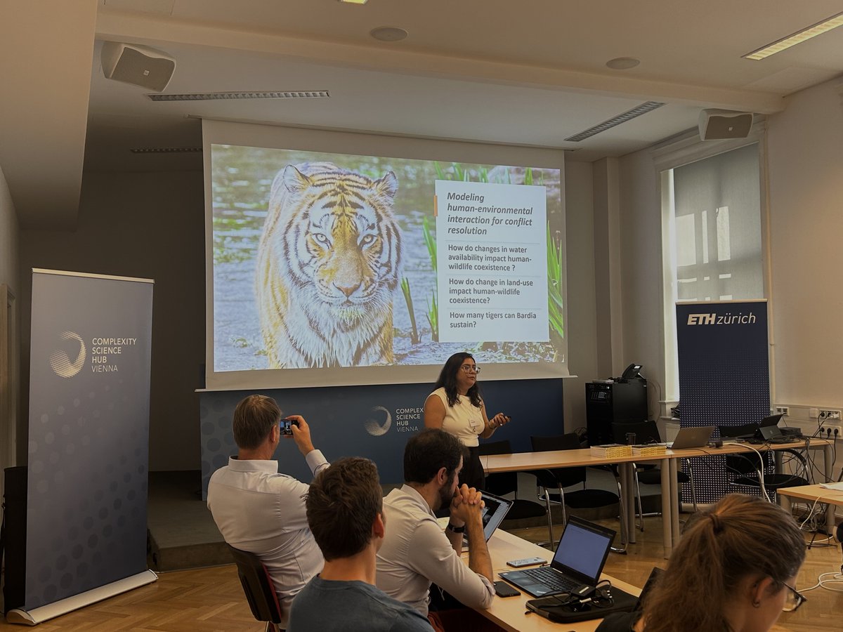 SOSBanerjee's tweet photo. "Designing Emergence" in my talk today at #ComplexityScienceHubVienna with @COSS_eth, I present the significance of emergent values in the design and analysis of socio-technical and ecological systems, such as co-existence with nature and participation during disasters. https://t.co/js8sygrsgm