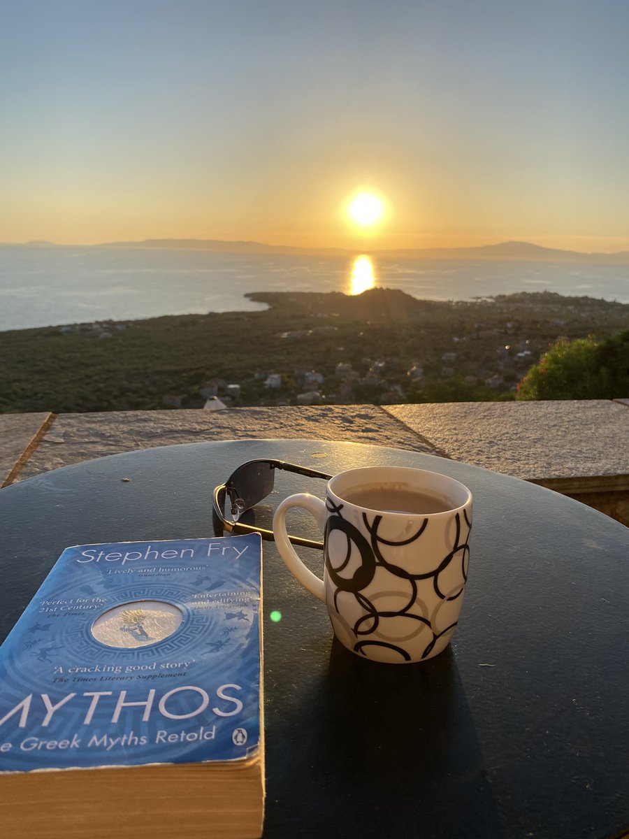 Reading Mythos while overlooking the Peloponnese as the sun sets, with a cup of PG Tips to boot. Doesn’t get better than this @stephenfry