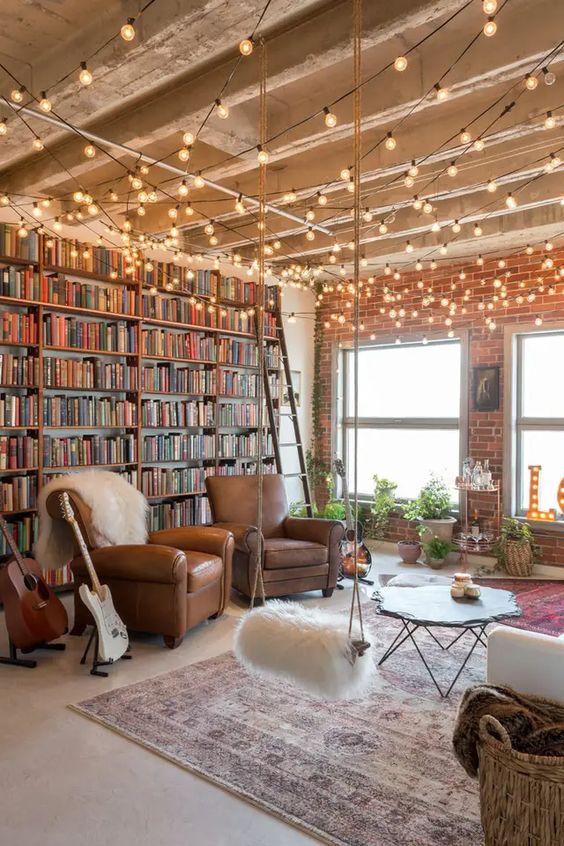 Is there anything prettier than a library with fairy lights? 😍 I also love the exposed brick and big windows. What do you think? 🥰🤍📖💫🌿
#librarylove #beatifulbooks
📷pin.it/2D385nf