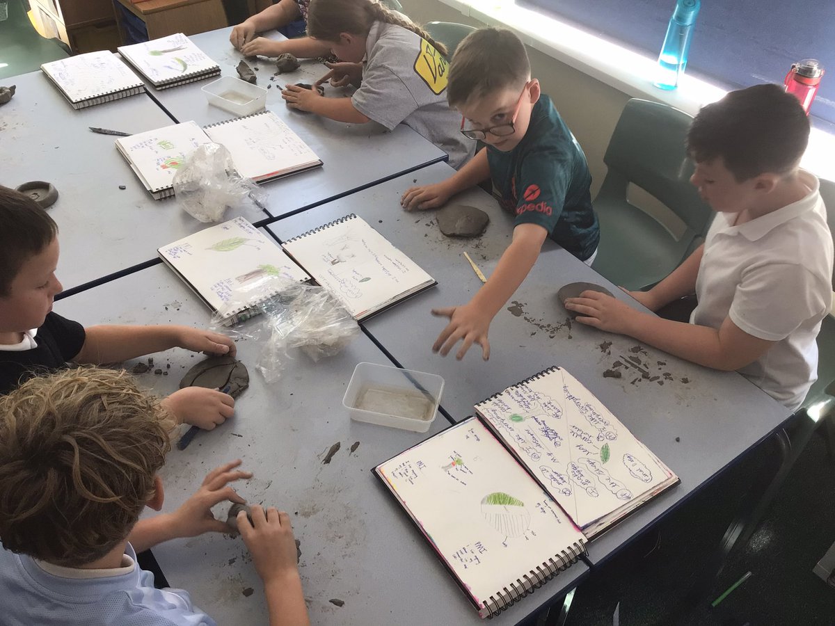 OJS_Year4's tweet photo. Making our clay vessels. Our design brief was to create a vessel that would hold a tea light and had a theme of ‘nature’. We have worked so hard with the designing and making. We will now leave them to dry and hope they stay in one piece 🤞🏼🤞🏼 https://t.co/ZyJEgHtokg