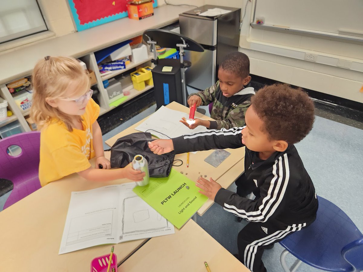 MsAHuffz's tweet photo. Faces of concentration... 
First Graders at @A2_Carpenter working on the @PLTW Launch design problem. @A2schools https://t.co/xf5KciUgcr