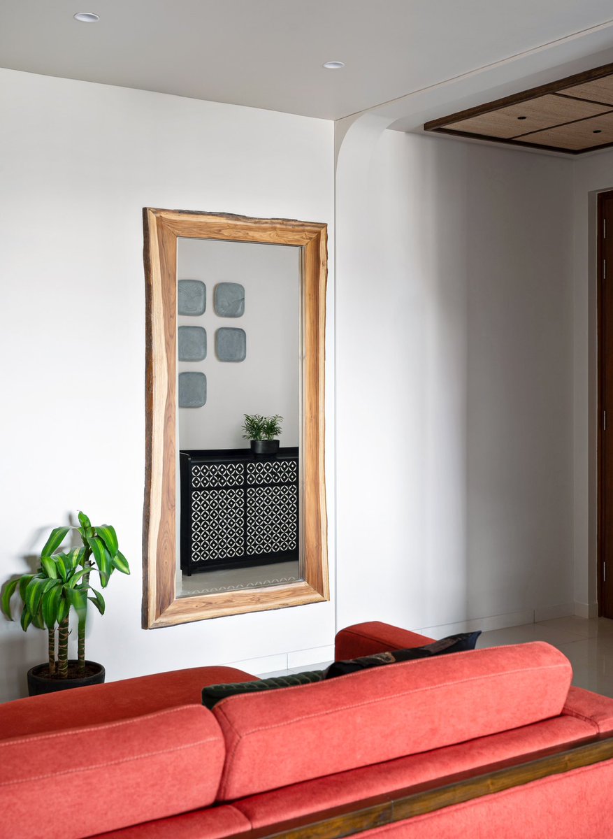 studioipsa's tweet image. A large mirror, framed with live edged wood, placed between the Living and Foyer of ‘The Tropical Melody’, which multiplies light into the foyer and works up a charm with its mere presence.
.
.
#studioipsa #uandidesigns #interiordesign #interiordesigner #interiordesignideas
