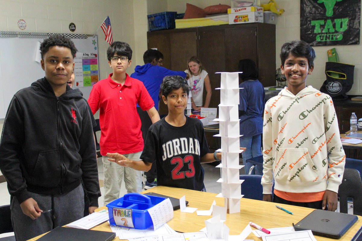 Ms. Berkey's students at Crossroads North wrote their common interests and opinions on index cards, then used the cards to participate in a tower-building challenge.