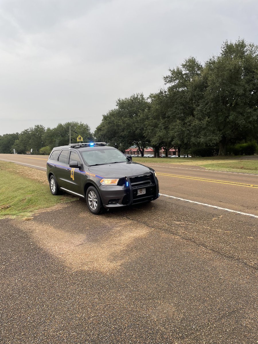 MHPTroopD's tweet photo. With a busy agenda in the morning, itโs easy to be distracted while driving. Thankfully, the men and women of the Mississippi Highway Patrol are stationed in school zones to remind you to slow down and stop for buses while loading and unloading. #OperationStop https://t.co/hKu1aw3TOE