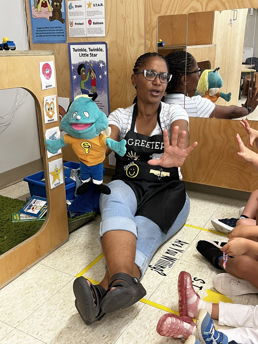 PortobelloELC's tweet photo. Ms. Arnielle and Schubert teaching the children to S.T.A.R.: Smile, Take a deep breath And Relax. S.T.A.R. is one of four core breathing techniques in Conscious Discipline. 🌟@OCChildCareCorp @ConsciousD https://t.co/qErhZwzLRs