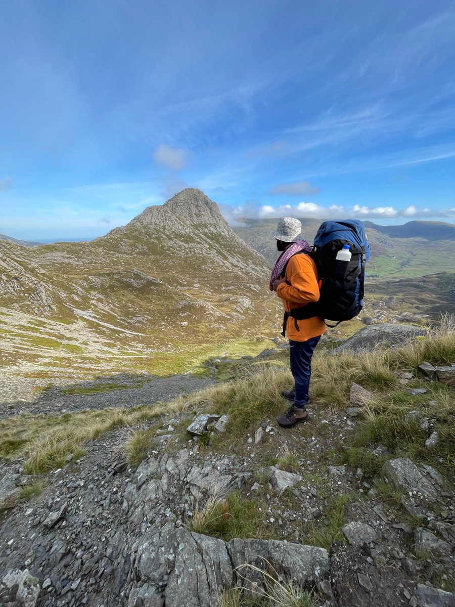 Tewoolde's tweet photo. On top of  #ResidentialTrip duty, on top of #Tryfan  a mountain in the Ogwen Valley, Snowdonia,🏴󠁧󠁢󠁷󠁬󠁳󠁿. A 24 hrs hiking and camping 🏕️ complete! Two more days of inspiring the next generation in action. So far inspired by the resilience of our students who are taking up the challenge. https://t.co/MggKWMbX3u
